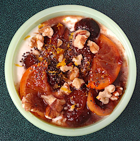 apricots, prunes, oranges, lemons, walnuts and chia seeds with yogurt