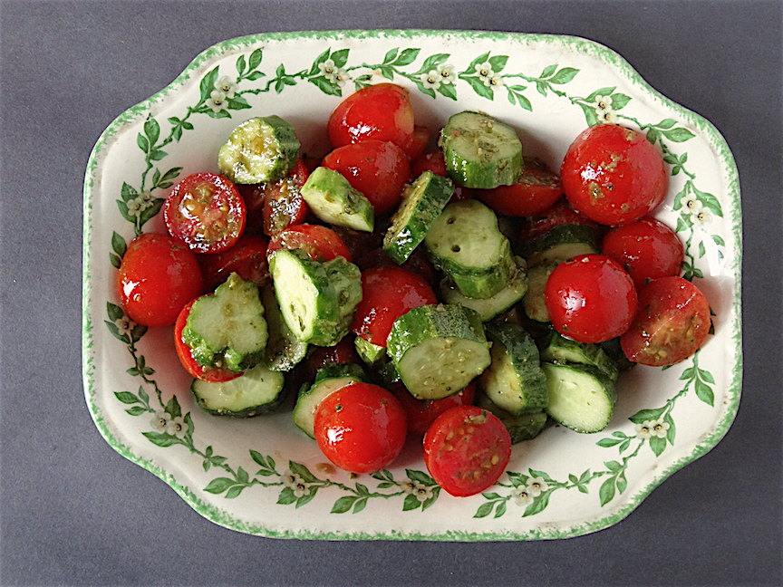 Tomato and cucumber salad with pesto vinaigrette