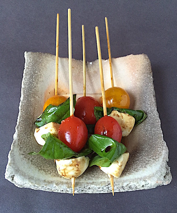 Caprese hors d'oeuvre with cherry tomatoes and bocconcini Plate by Simon Levin