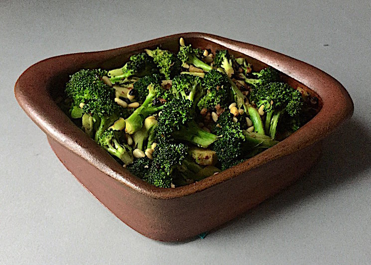 Broccoli with Garlic, Currants, Chili Flakes and Pine Nuts Flameware Casserole Dish by Robbie Lobell