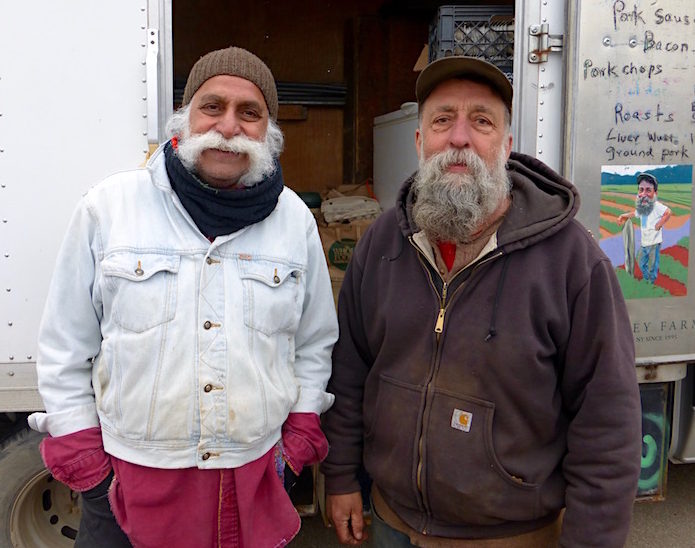 Ray (right) and his sales associate Hardeep Maharawal at the Grand Army Plaza Greenmarket in early spring