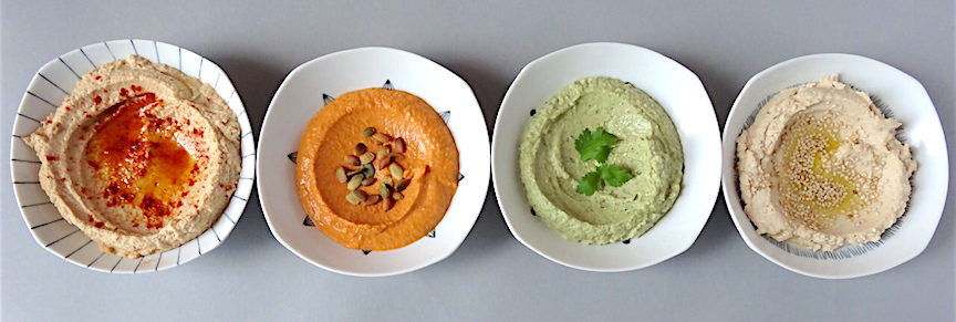 Smoked paprika, roasted red pepper, cilantro & jalapeño and sesame hummus Porcelain bowls from Sara Japanese Pottery on Lexington Avenue