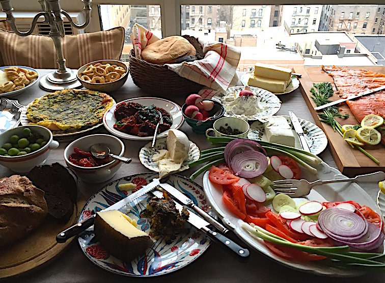 Indoor potluck picnic at a friend's apartment